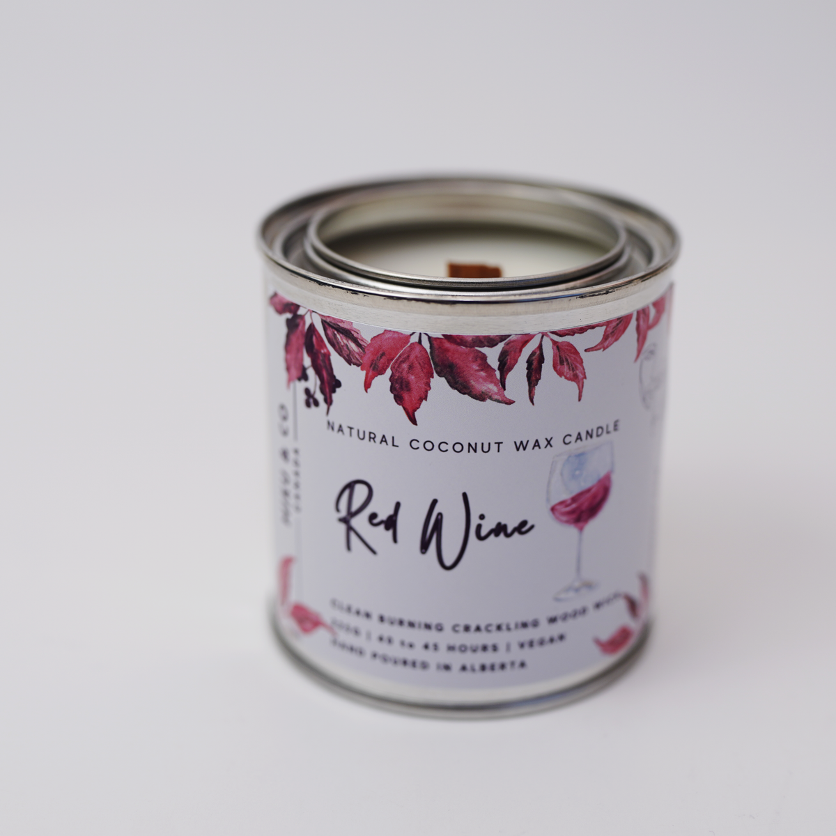 Miku & CO Canada natural coconut wax red wine scented candle in a small tin container
